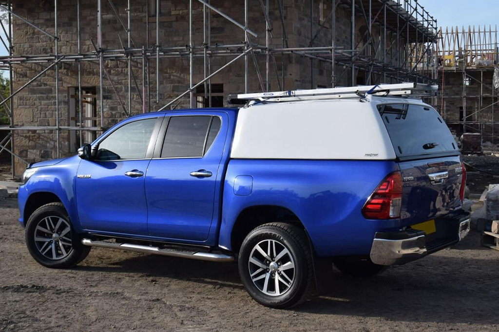 Toyota Hilux 2016 model with a ProTop Tradesman Canopy in white