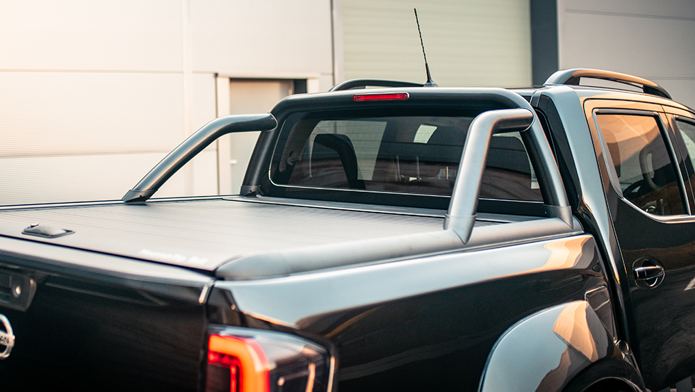 Navara NP300 fitted with Mountain Top Roller Shutter and Roll Bar