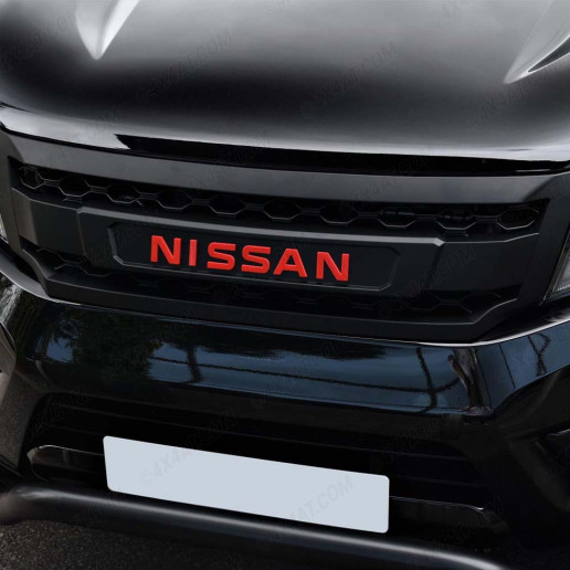 Close-up view of the Nissan Navara NP300 Matte Black Grille with Red Logo