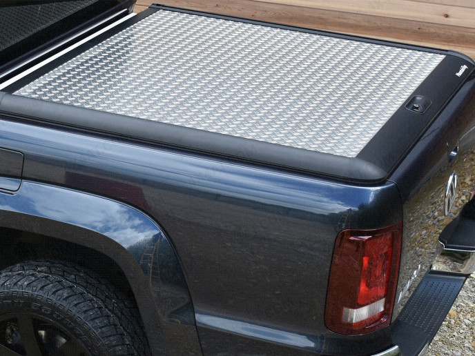 Close-up view of the VW Amarok 2011-2020 Mountain Top Chequer Lift-Up Tonneau Cover