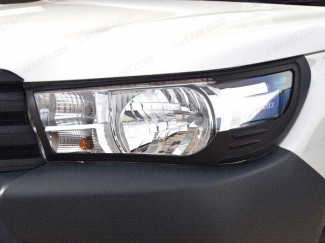 Black headlamp surround for Toyota Hilux