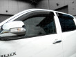 Dark smoke, tinted Toyota Hilux 7 Double Cab wind deflectors front view