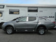 Mitsubishi L200 fitted with door pillar trims, roll bar, alooy wheels and chrome trim