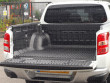 Over rail load bed liner fitted to a Mitsubishi L200