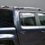 Side angle view of the VW Amarok 2011-2020 Silver Roof Rails