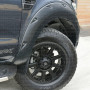 9-inch Wheel Arches in matte black (available in various colours) 