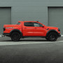 Red Raptor fitted with an Alpha SC-Z Sports Tonneau