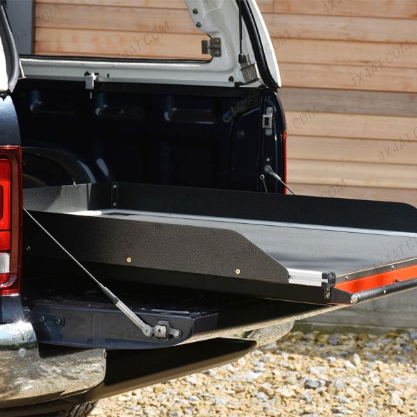 Side angle view of the VW Amarok 2010-2020 Standard Load Bed Slide in Rhino Finish