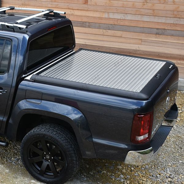 Close-up view of the VW Amarok 2010-2020 Mountain Top Chequer Lift-Up Tonneau Cover
