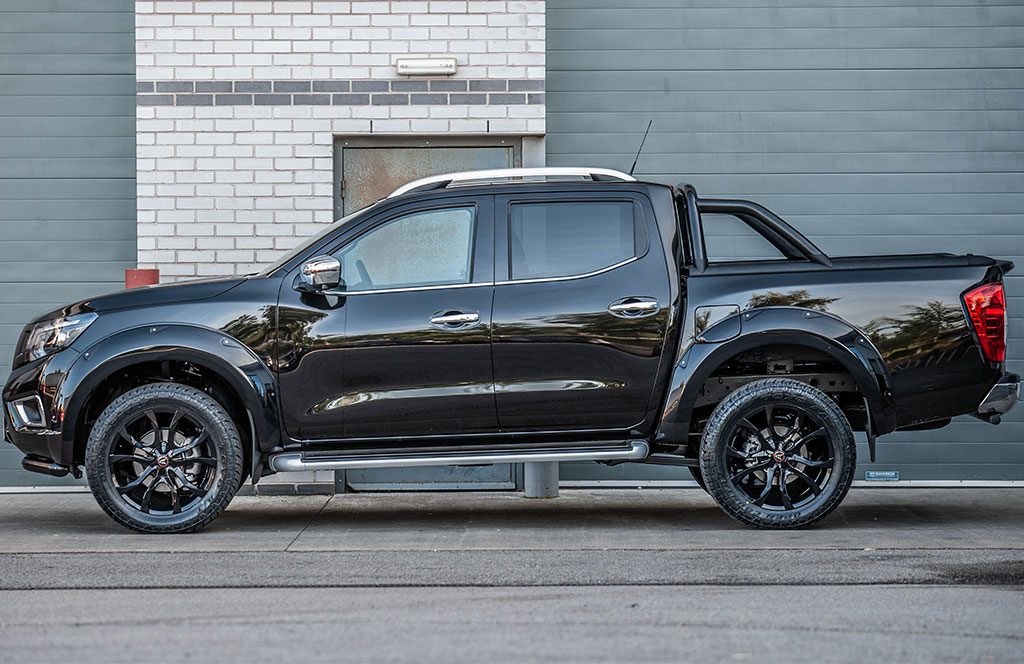 black nissan navara np300 with accessories - side view