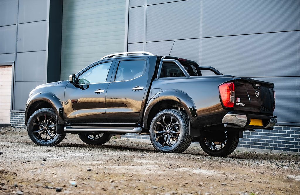 black nissan navara np300 with accessories - rear corner view