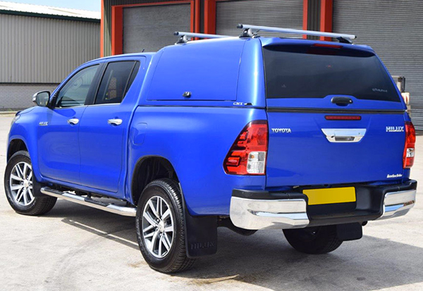 Toyota Hilux fitted with an Alpha CMX Truck top canopy in Blue 8X2
