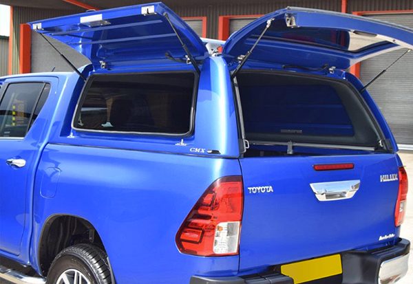 Toyota Hilux fitted with an Alpha CMX Truck top canopy in Blue 8X2