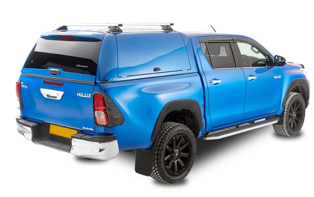 Toyota Hilux fitted with an Alpha CMX that has open side doors and tailgate closed