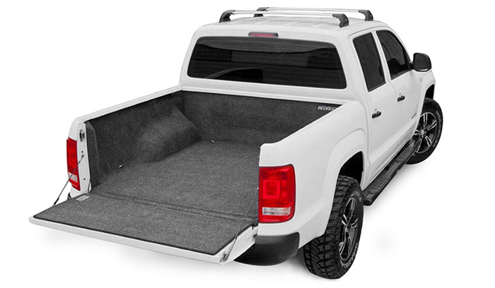 Left side view of the Bed rug liner in a pickup truck