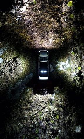 Aerial view of a pickup truck with Lazer LED lights switched on