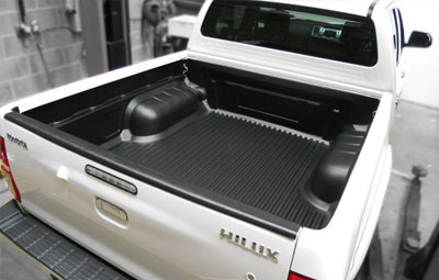 Toyota Hilux with an under rail bed liner