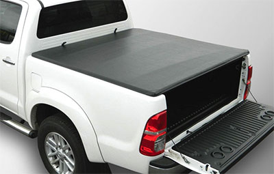 Taught soft hidden snap load bed cover on a pickup truck
