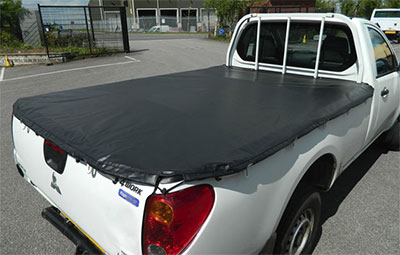 Mitsubishi single cab fitted with soft hooked load bed cover