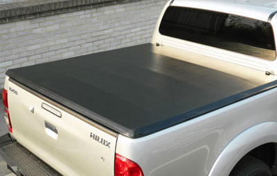 Soft tri folding load bed cover on a Toyota Hilux pickup