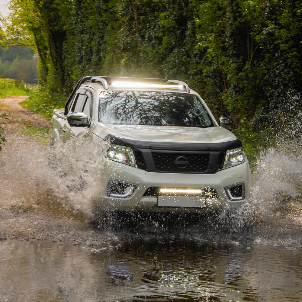 Nissan Navara off-roading with Lazer Lamps roof light bar